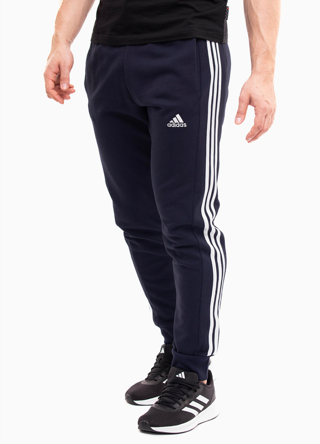 adidas Herrenhose Essentials French Terry Tapered Cuff 3-Stripes IC9406 adidas Herrenhose Essentials French Terry Tapered Cuff 3-Stripes IC9406