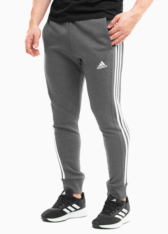 adidas Herrenhose Essentials French Terry Tapered Cuff 3-Stripes IC9408 adidas Herrenhose Essentials French Terry Tapered Cuff 3-Stripes IC9408